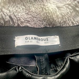 Black leather skinny pants with fringes